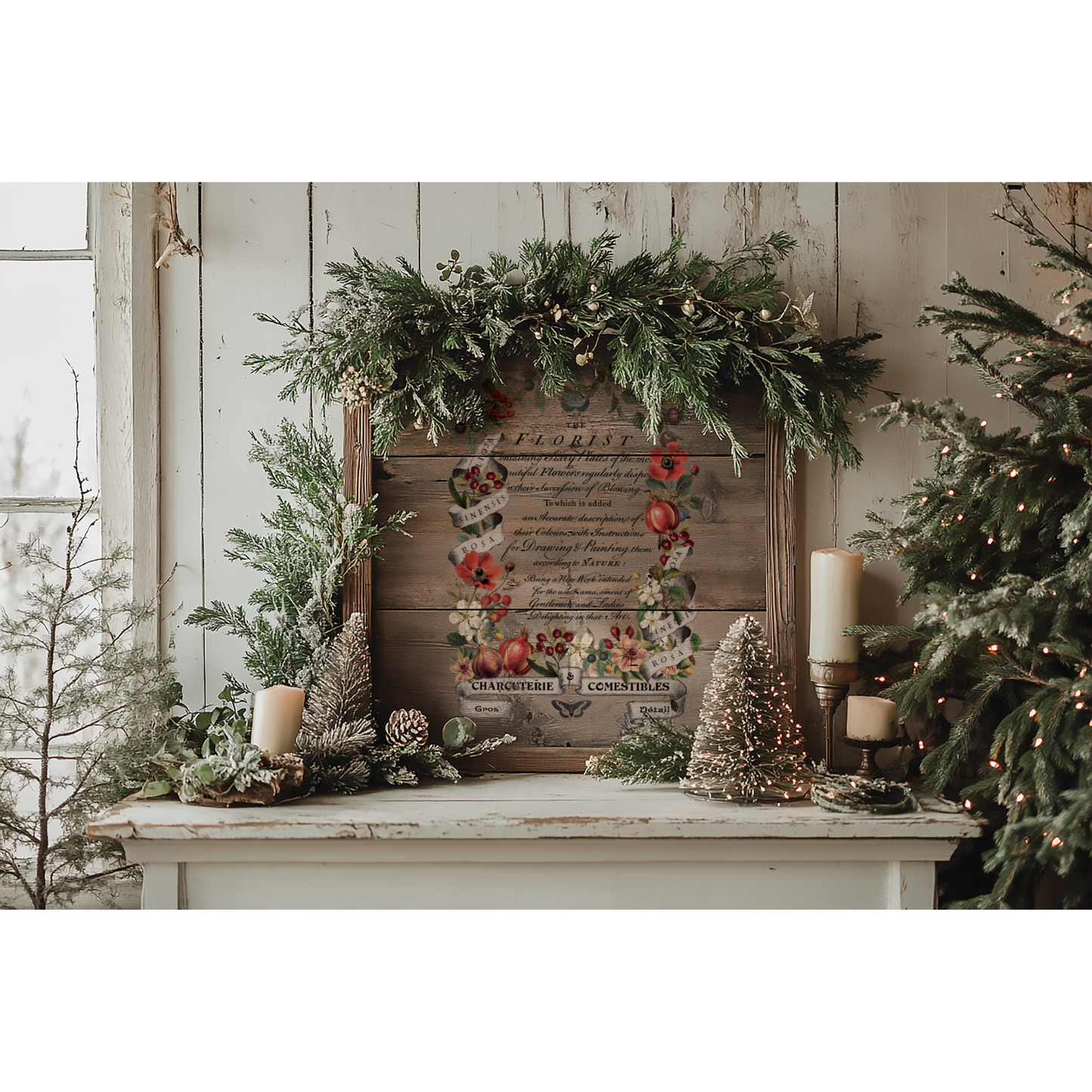 "Clementine" IOD Transfer by Iron Orchid Designs. Pic 1. Decorative signage on mantel with Christmas trees, candles, and a floral sign against a wooden wall.