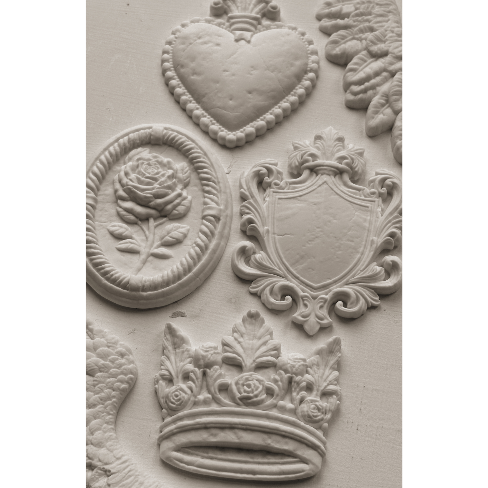 "Heraldry" IOD Mold by Iron Orchid Designs. 6" x 10" silicone mold. Available at Milton's Daughter. Casting example.