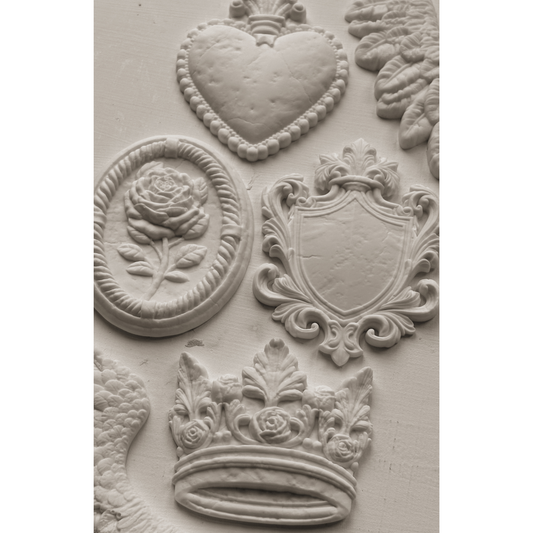 "Heraldry" IOD Mold by Iron Orchid Designs. 6" x 10" silicone mold. Available at Milton's Daughter. Casting example.