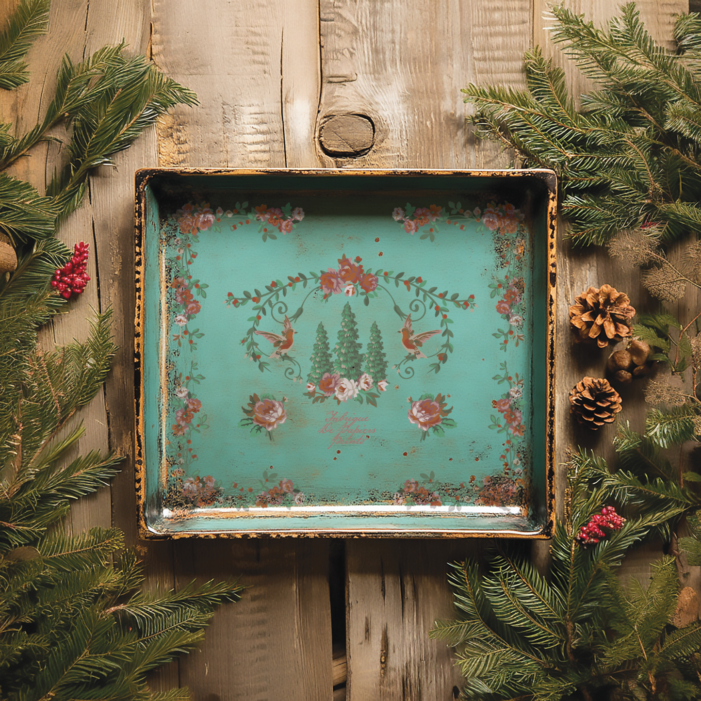 "La Folie" IOD Paint Inlay by Iron Orchid Designs. Example pic 3. Transfer available at Milton's Daughter. Decorative tray with floral design on a wooden background with greenery.