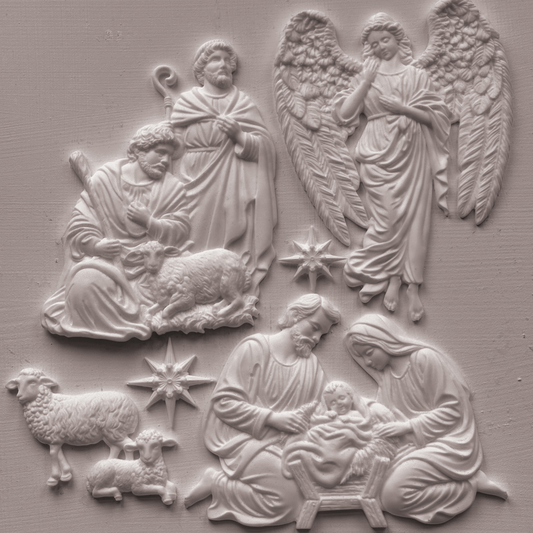 Castings of IOD Mold SIlent Night, featuring nativity scenes with Mary, Joseph, baby Jesus, sheep, and two angels on a textured light gray background.