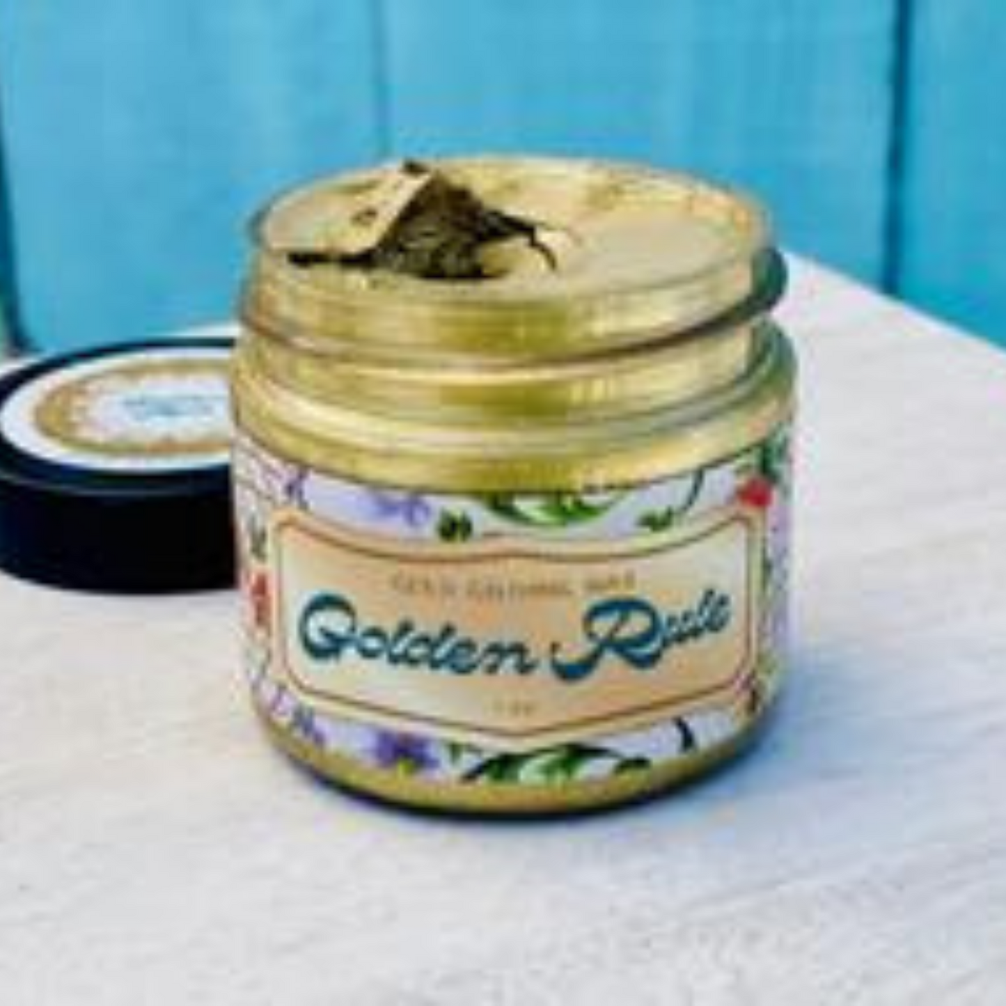 Golden Rule Gold Gilding Wax by Debi's Design Diary DIY Paints. Product photo. Available at Milton's Daughter.
