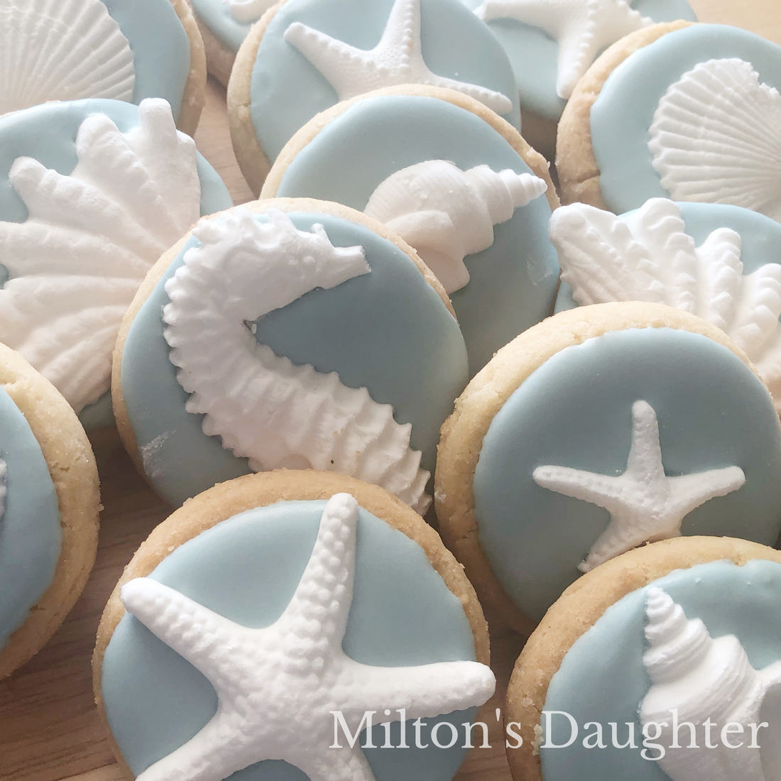 Royal Icing on Keebler Shortbread Sandies decorated with Royal Icing toppers using Sea Shells Mold by IOD by Milton's Daughter