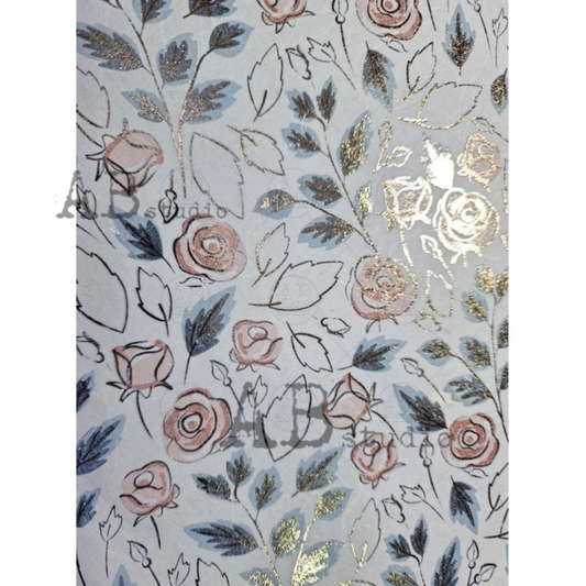 Decorative gilded paper with floral pattern in pink and blue.