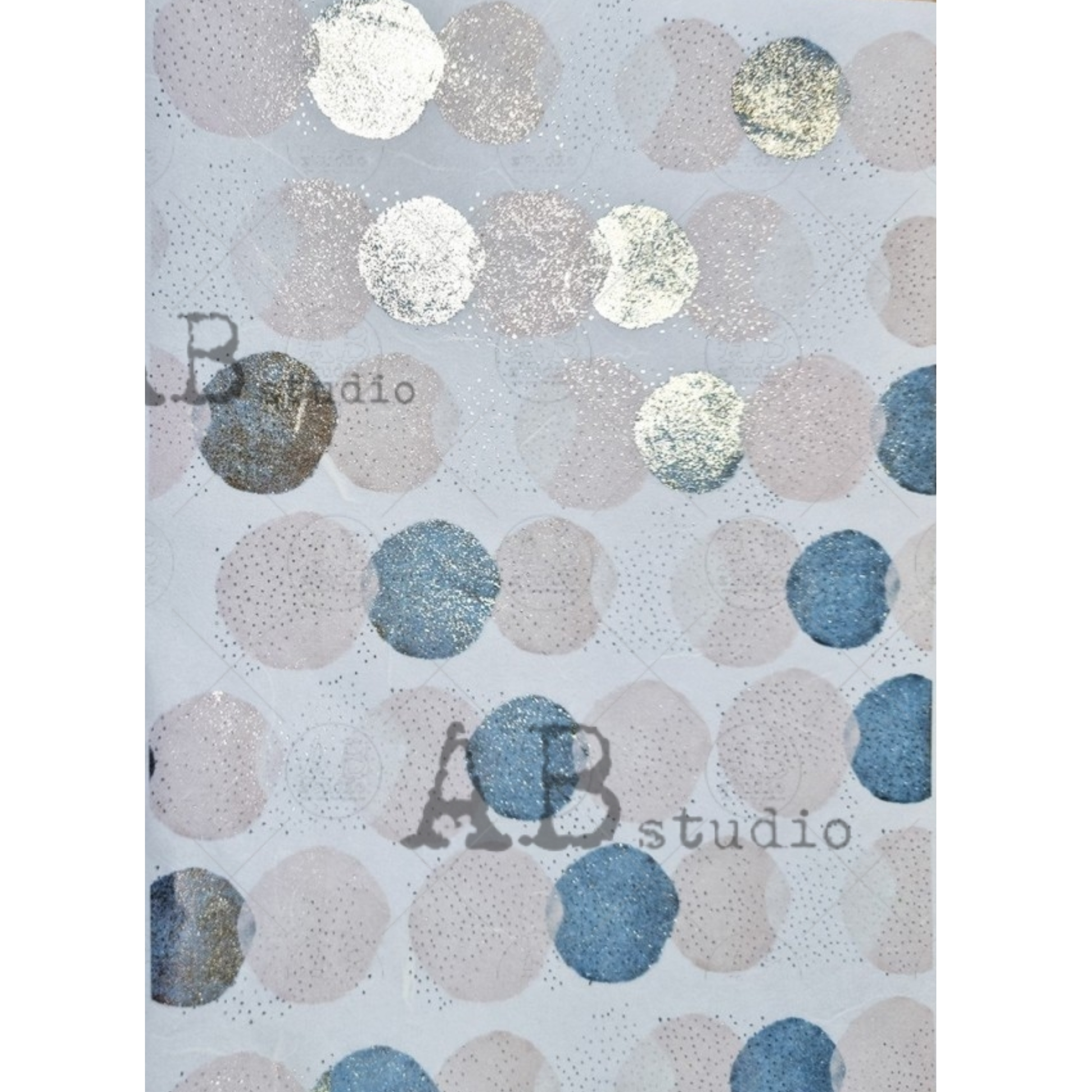 Gilded, patterned paper with circular shapes in various colors on a white speckled background.