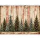 A rustic Christmas-themed rice paper featuring a weathered red and beige wooden plank background with a row of green pine trees decorated with white snow, red berries, and pinecones along the bottom.