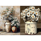 Two rustic milk jugs with flowers against a textured wall and wooden surface.
