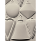 "Bibelots 2" IOD Mould by Iron Orchid Designs. Silicone mold with various geometric ornament shapes. Casting example. Available at Milton's Daughter. 