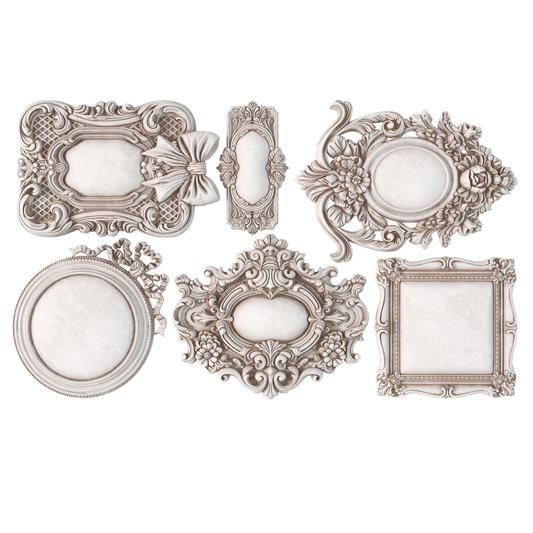 Set of decorative ornate frame castings on a white background