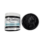 Black flexible paste jar with open lid on a white background