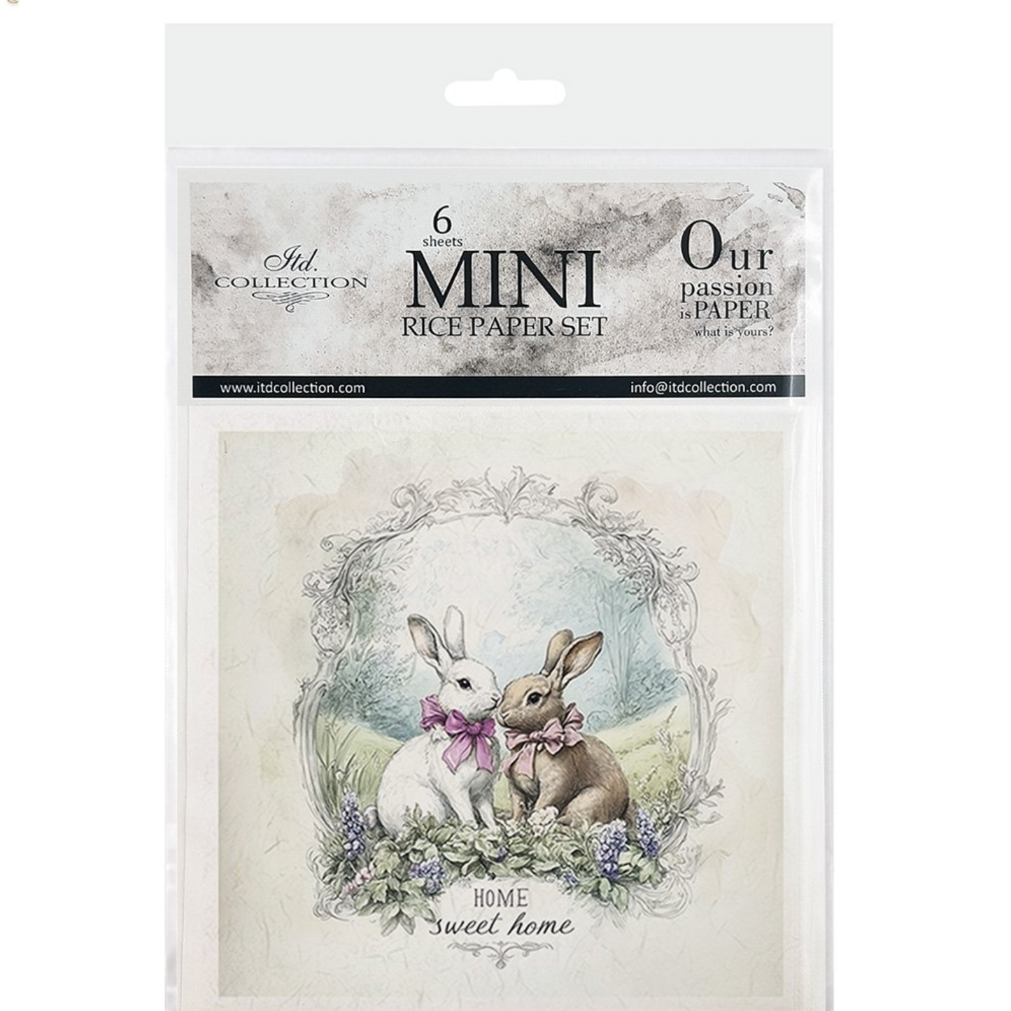 Packaging of mini rice paper set with two rabbits and floral design on a white background