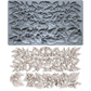 A gray silicone mold with embossed holly and bay leaf patterns, shown above a set of matching light beige carved leaf and berry ornaments. The mold has printed dimensions and the text 'HAZEL & BAY' and '10D'.