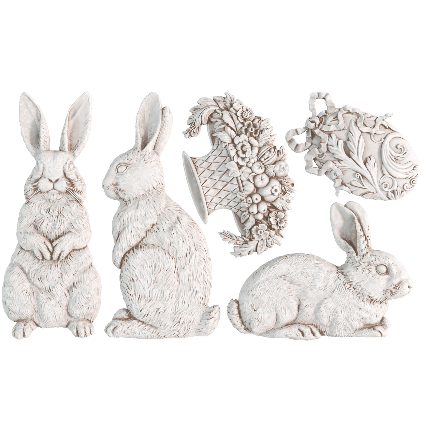 Decorative mould castings of white rabbits, bouquet and easter egg on a white background