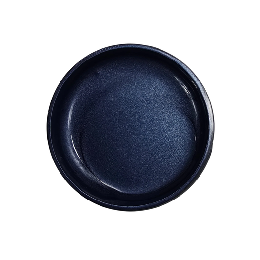 Dark blue metallic paint open jar on a white background