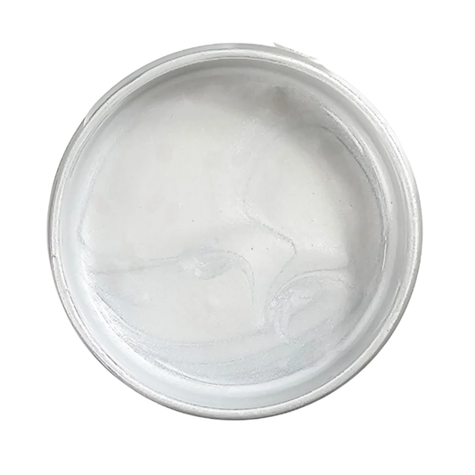 Open jar containing silver metallic paint.