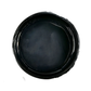 Open jar of black metallic paint on a white background