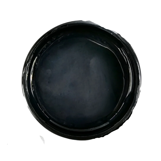 Open jar of black metallic paint on a white background