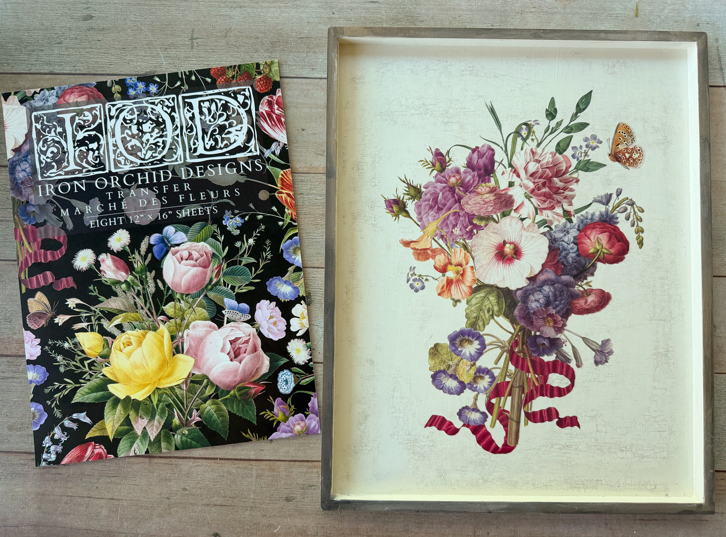 Marché Des Fleurs IOD Transfer book alongside completed project.