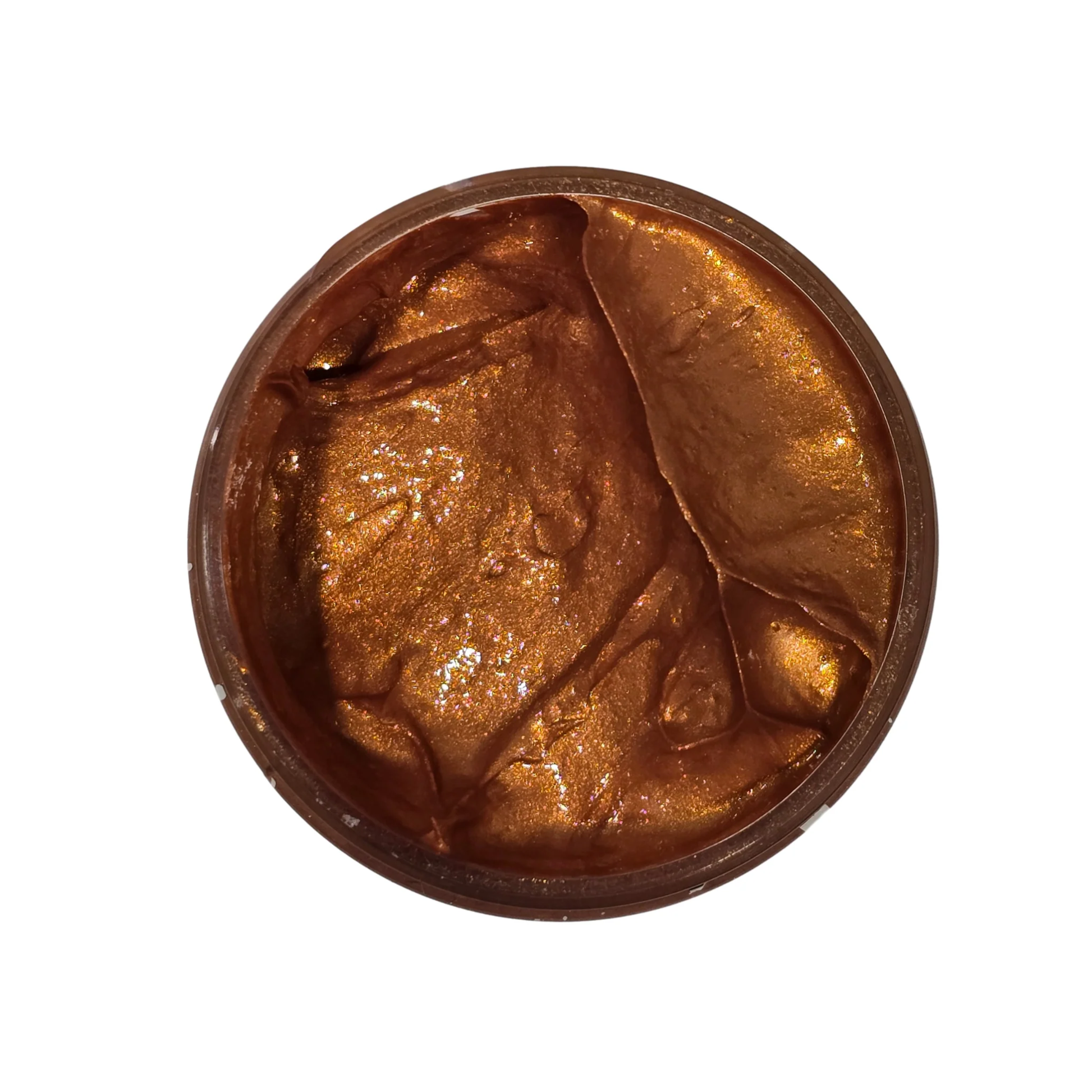 Copper colored paste in a jar on a white background.