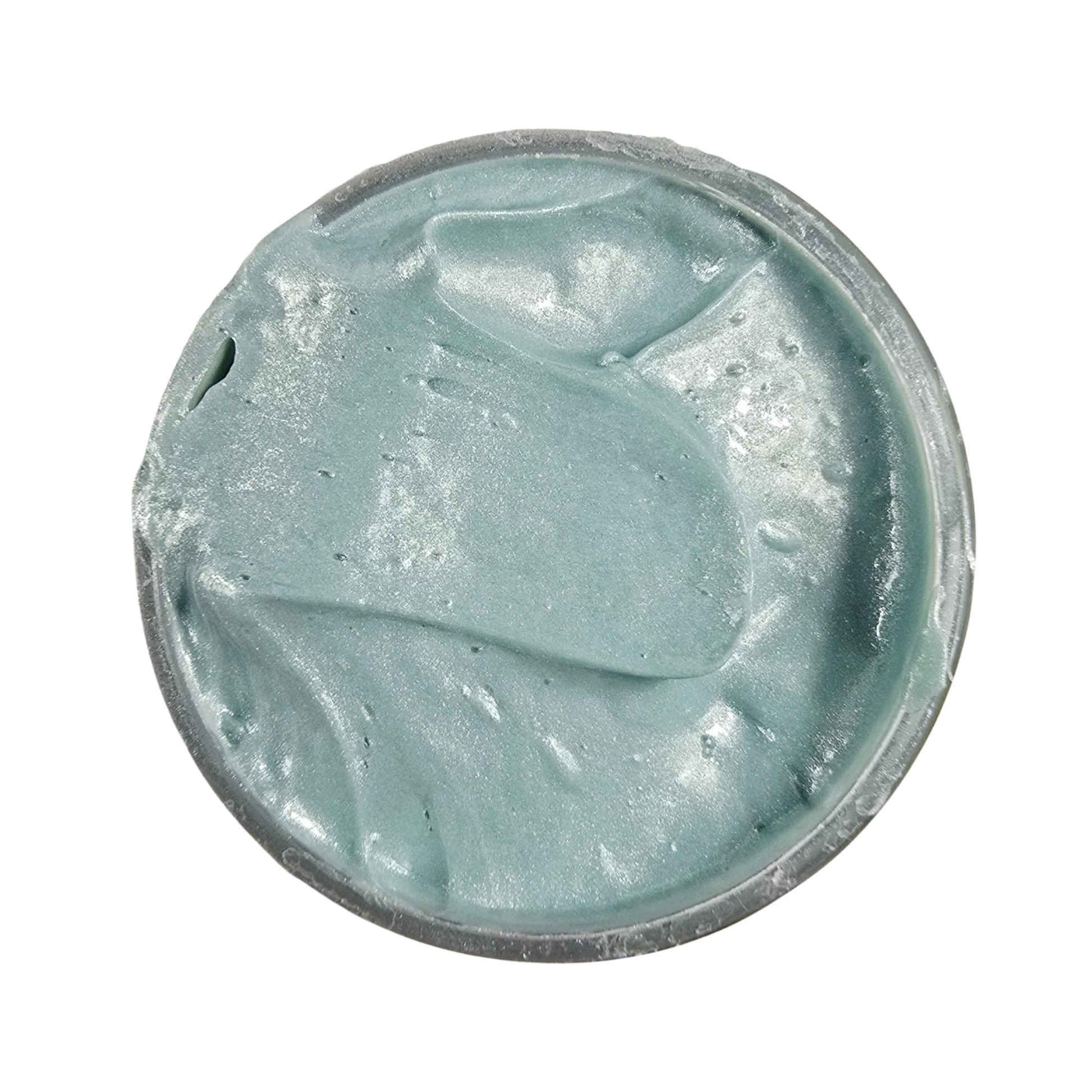 Light metallic blue colored paste in a jar on a white background.