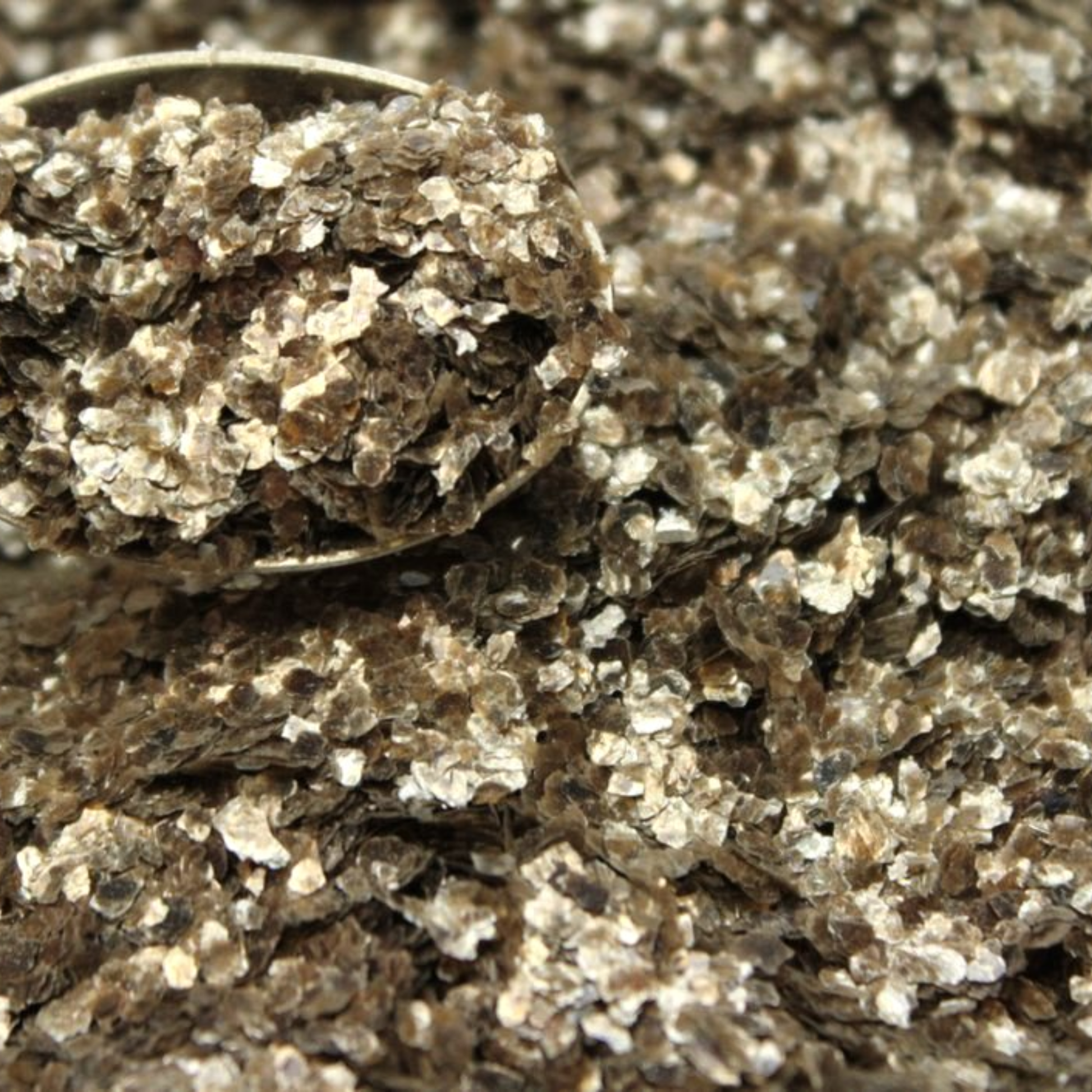 Close-up of textured brown metallic flakes.