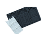 A dark gray silicone mold with detailed house-shaped cavities, shown with a small white house-shaped product sample in front, on a plain white background.