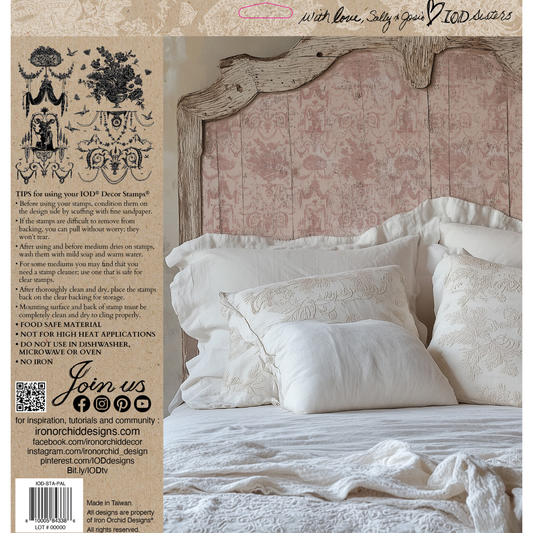 Back Cover of IOD Stamp Palais Des Fleurs featuring a decorative headboard with white bedding.