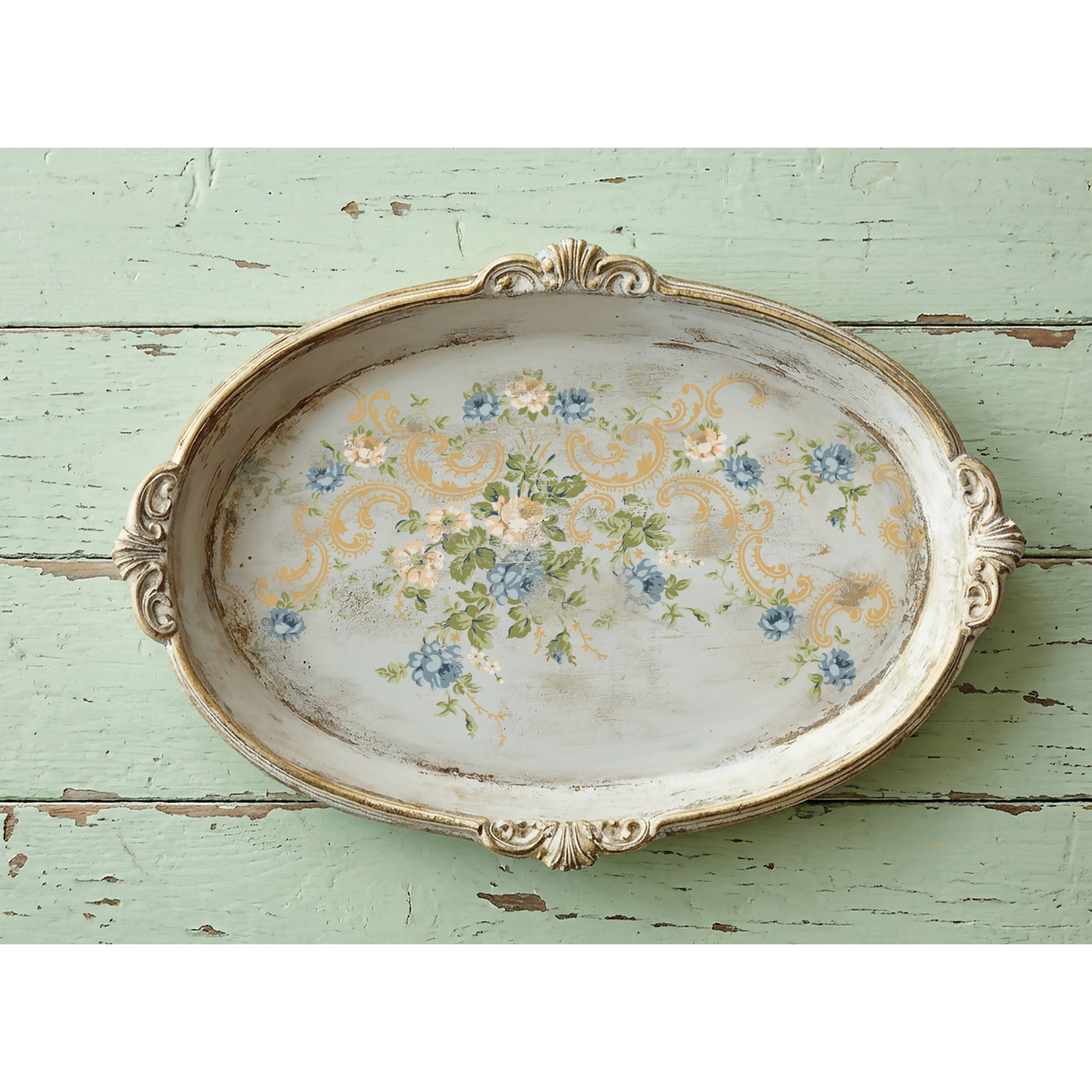 Decorative oval tray with floral design on a rustic wooden surface