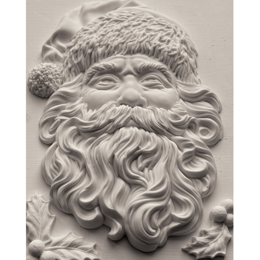 "Saint Nick" IOD Mould by Iron Orchid Designs. Available at Milton's Daughter. 5" x 7" deep mould. Silicone mold shaped like a Santa Claus face. Casting example.