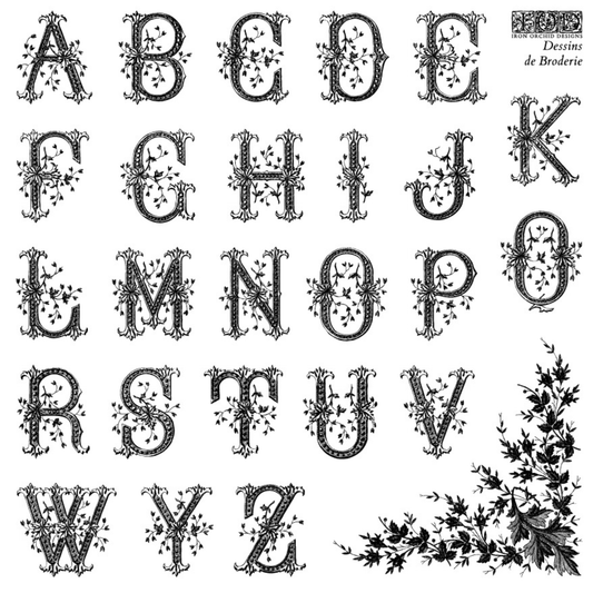Decorative alphabet letters with intricate designs on a white background