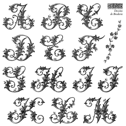 Decorative black letters A to M on a white background.