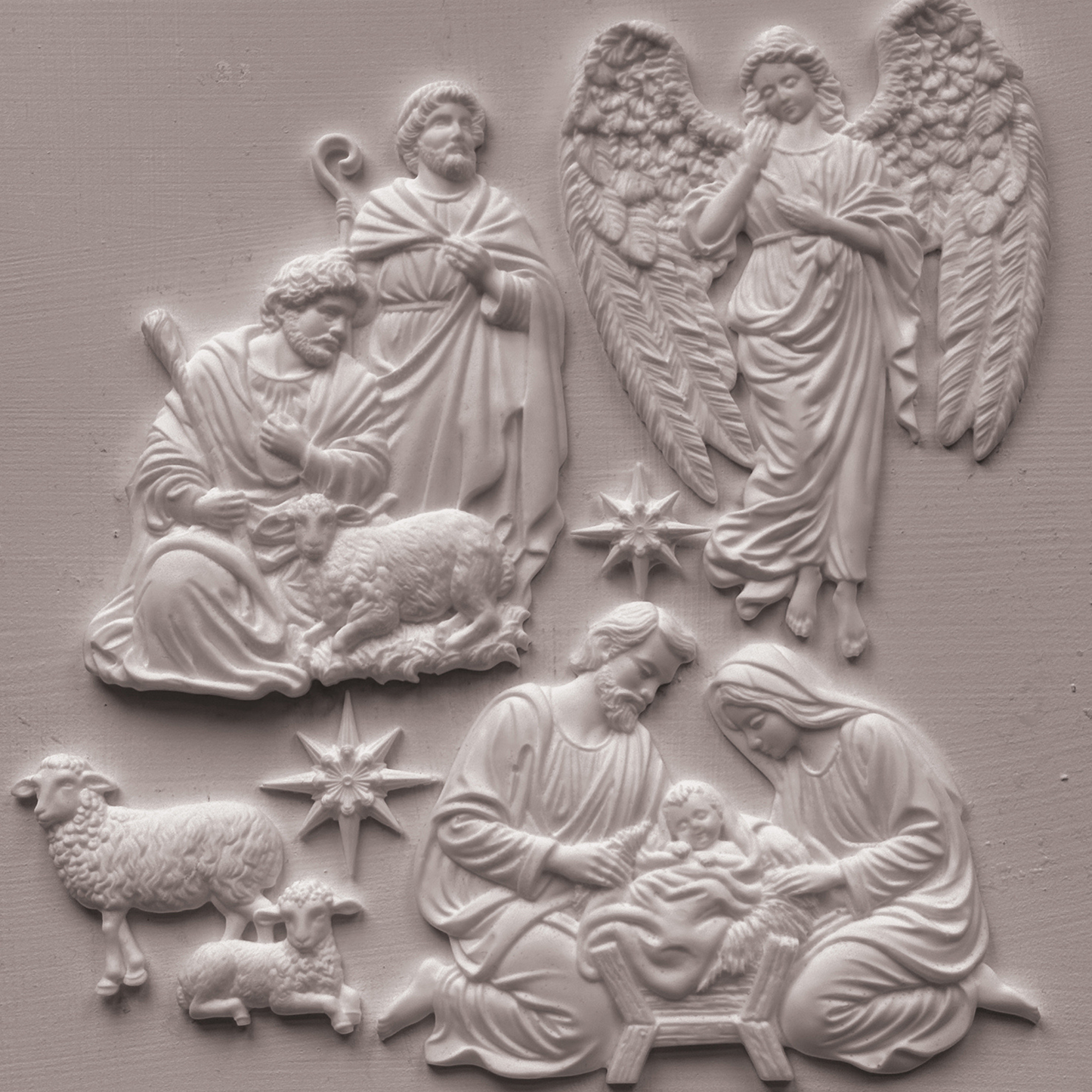 Castings of IOD Mold SIlent Night, featuring nativity scenes with Mary, Joseph, baby Jesus, sheep, and two angels on a textured light gray background.
