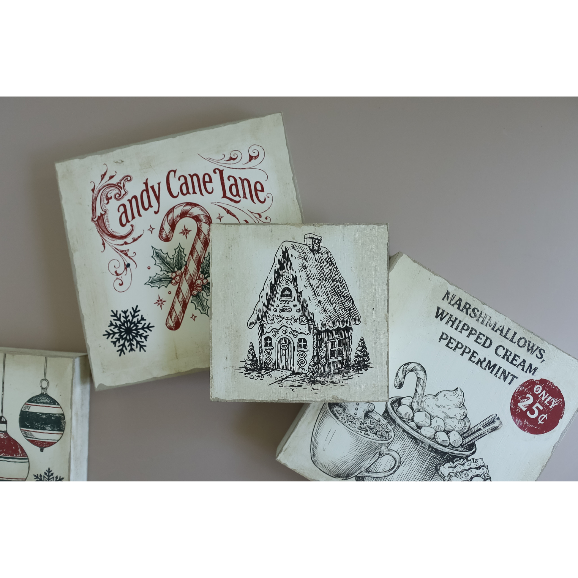 Three vintage-style signs displayed on a neutral background. The left sign features a Christmas design with the text 'Candy Cane Lane' and a large candy cane motif.