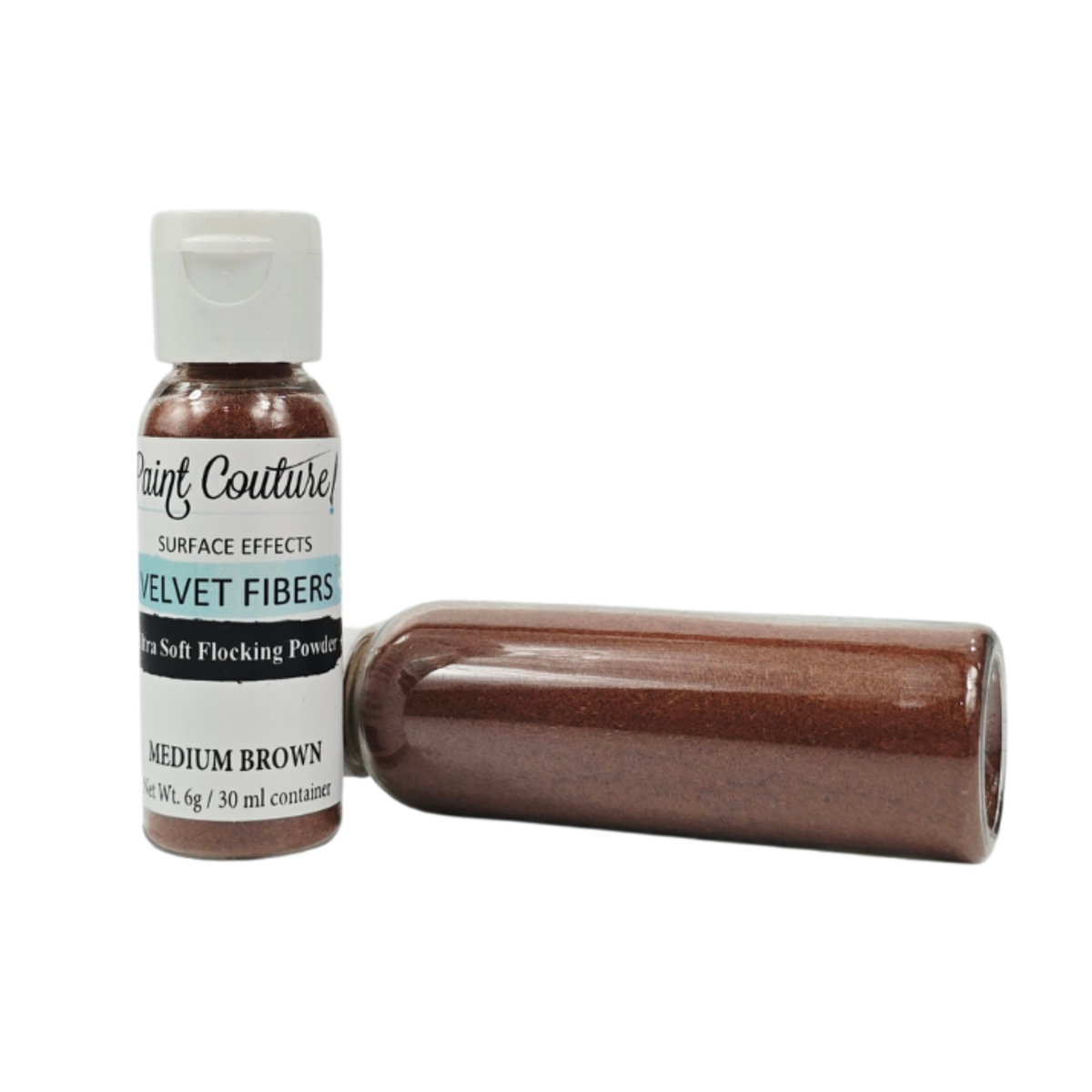 A small bottle of Paint Couture Velvet Fibers surface effect powder in Medium Brown, shown upright next to a horizontal tube containing the brown powder, on a plain white background.