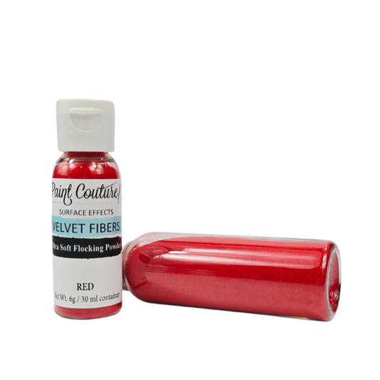 Paint Couture Velvet Fibers Red Soft Flocking Powder shown next to a bottle ying horizontally on a white background.