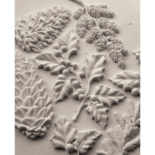 "Winter Forage" IOD silicone mould by Iron Orchid Designs. Available at Milton's Daughter.Silicone mold with winter foliage design. Casting example.