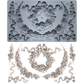IOD Wreaths & Swags mold side by side mould and castings. Decorative mold with wreath and swag designs on a white background