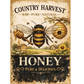 Vintage-style honey advertisement with a bee and honeycomb on a rustic background.
