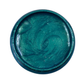 Close-up of emerald green metallic paint in a round container on a white background