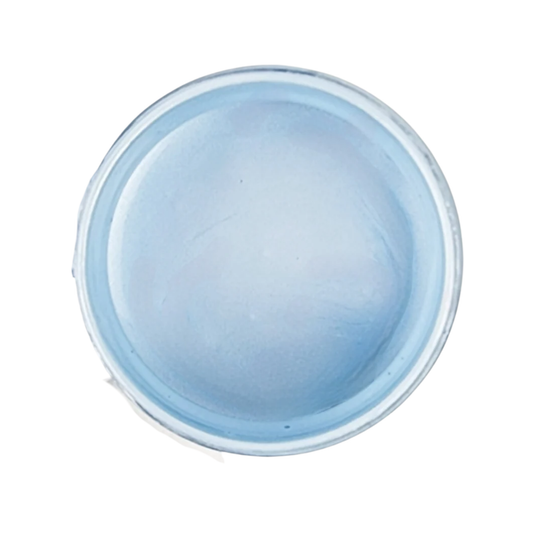 Open jar of sky blue metallic paint on a white background.