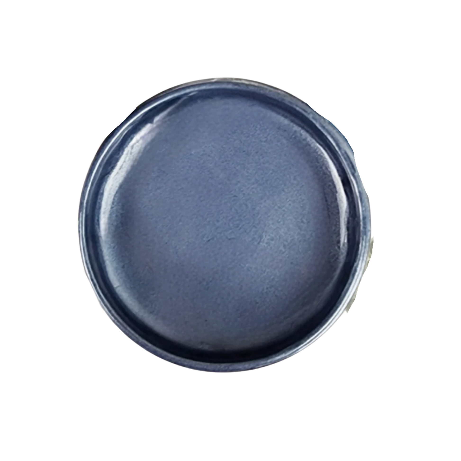 Open jar of deep blue metallic paint on a white background.