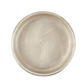Open jar of beige metallic paint on a white background.