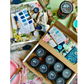 DIY Paint Mixology Lab 8 Color Sampler Box by Debi's DIY Paint and Debi's Design Diary. Contains eight 2 oz jars of DIY Paint for sampling and mixing countless color combinations. Available at Milton's Daughter. Open box photo 2.