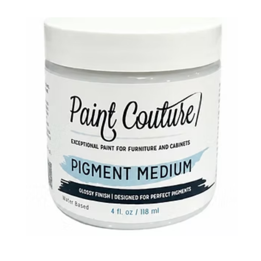 A white plastic jar of Paint Couture Pigment Medium with a white label and black text, shown on a plain white background.