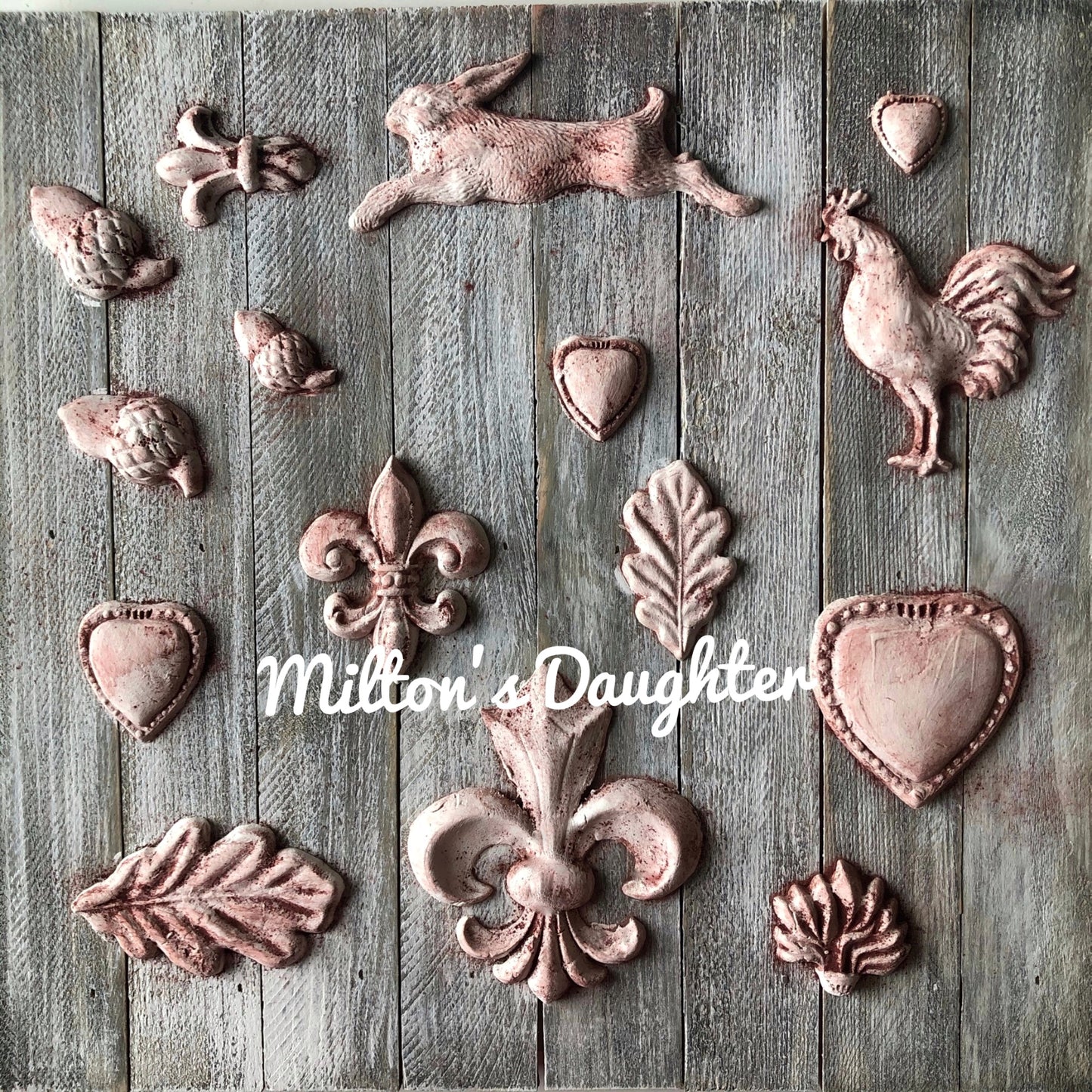 IOD Fleur De Lis Mold castings mounted on wood at Milton's Daughter