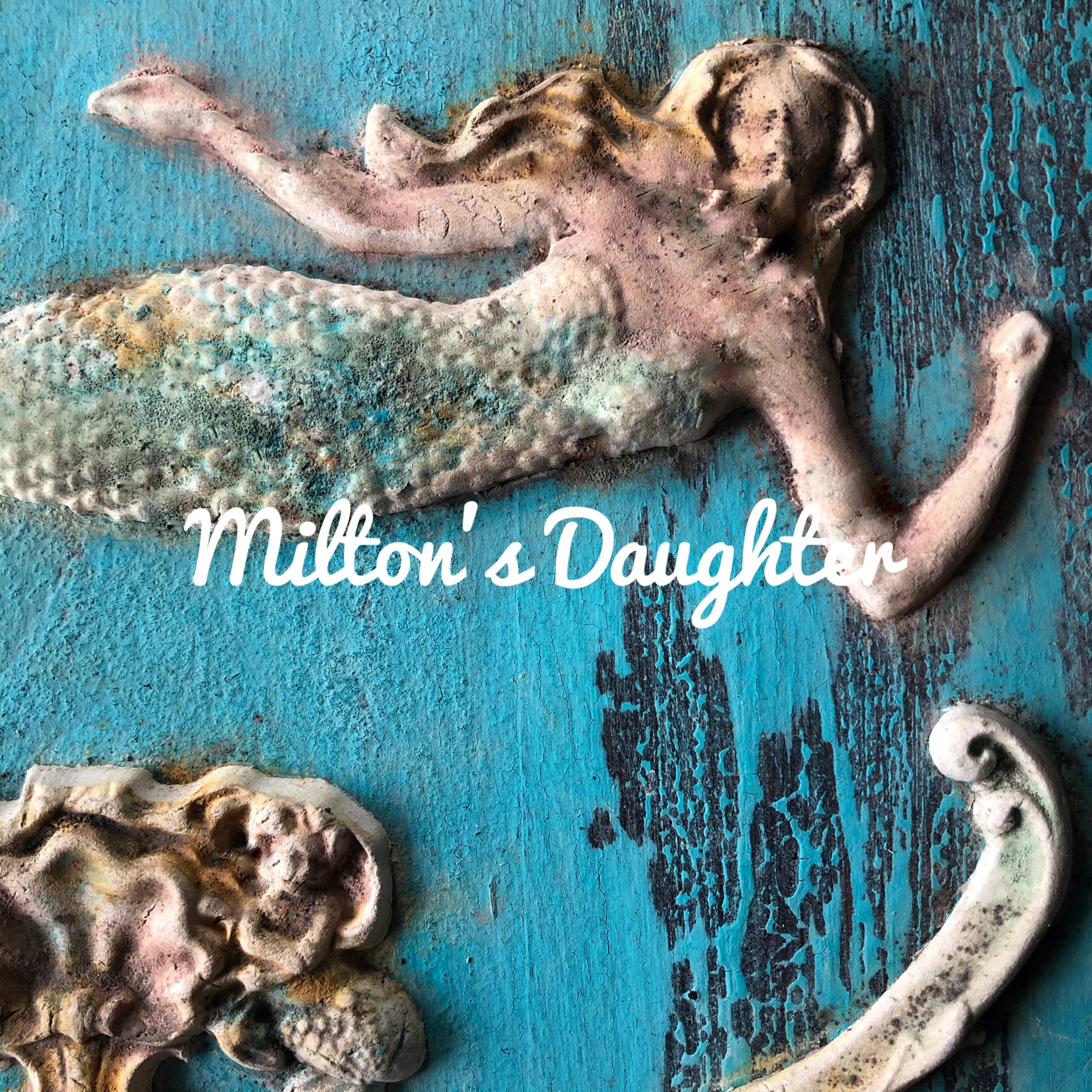 IOD Sea Sisters mold mermaid castings on blue background close detail by Milton's Daughter