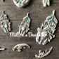 Wings and Feathers mold by IOD painted castings mounted by Milton's Daugher